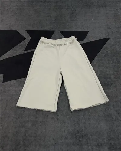 Pantaloni pantaloni pantaloni scurți din bumbac OEM alb, cu volane, talie elastică, picior lat, imprimeu Kornit DTGVânzare cu ridicata pantaloni scurți din bumbac OEM, pantaloni pantaloni cu volane, talie elastică, imprimeu Kornit DTG.